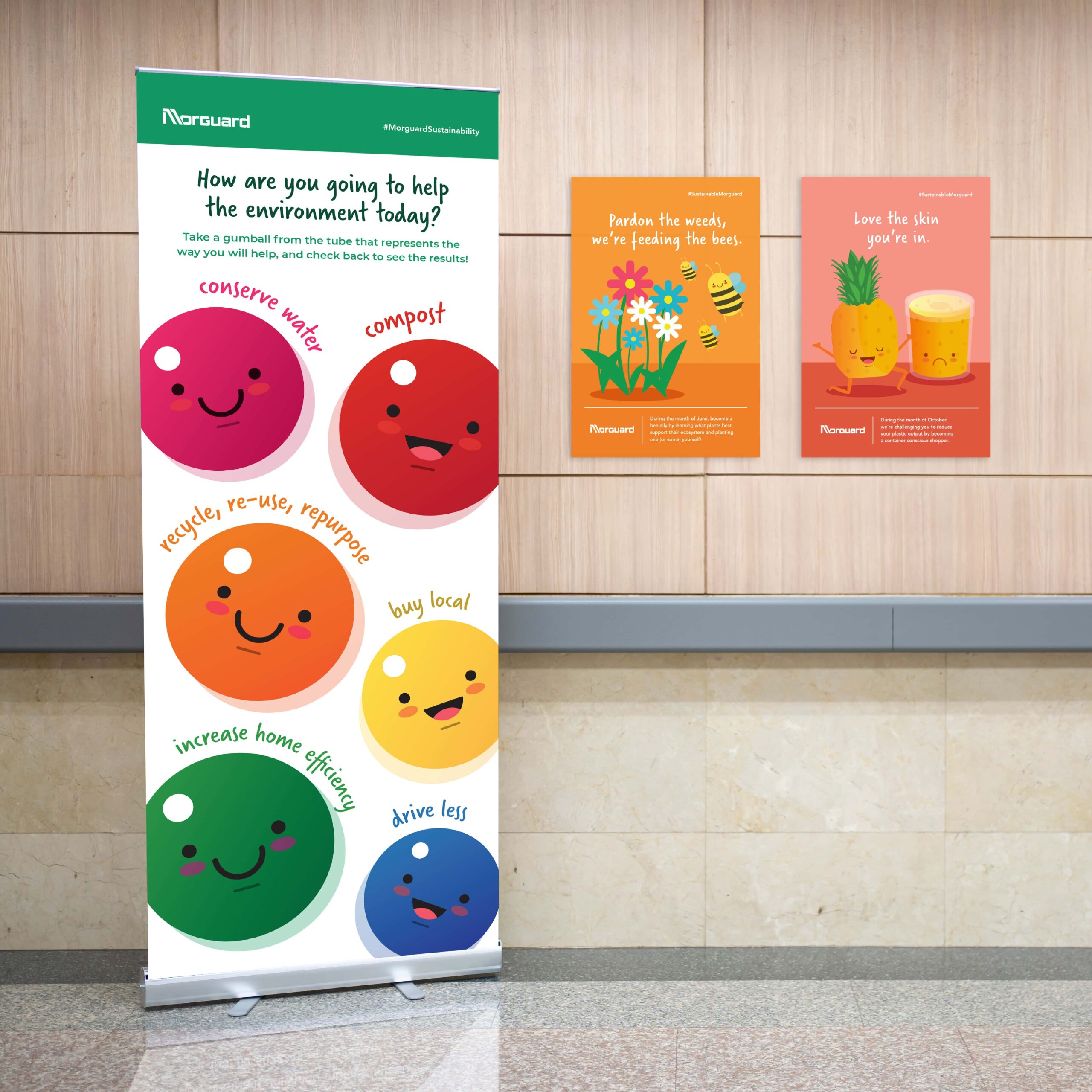 Banner with smiley faces next to two posters on wall