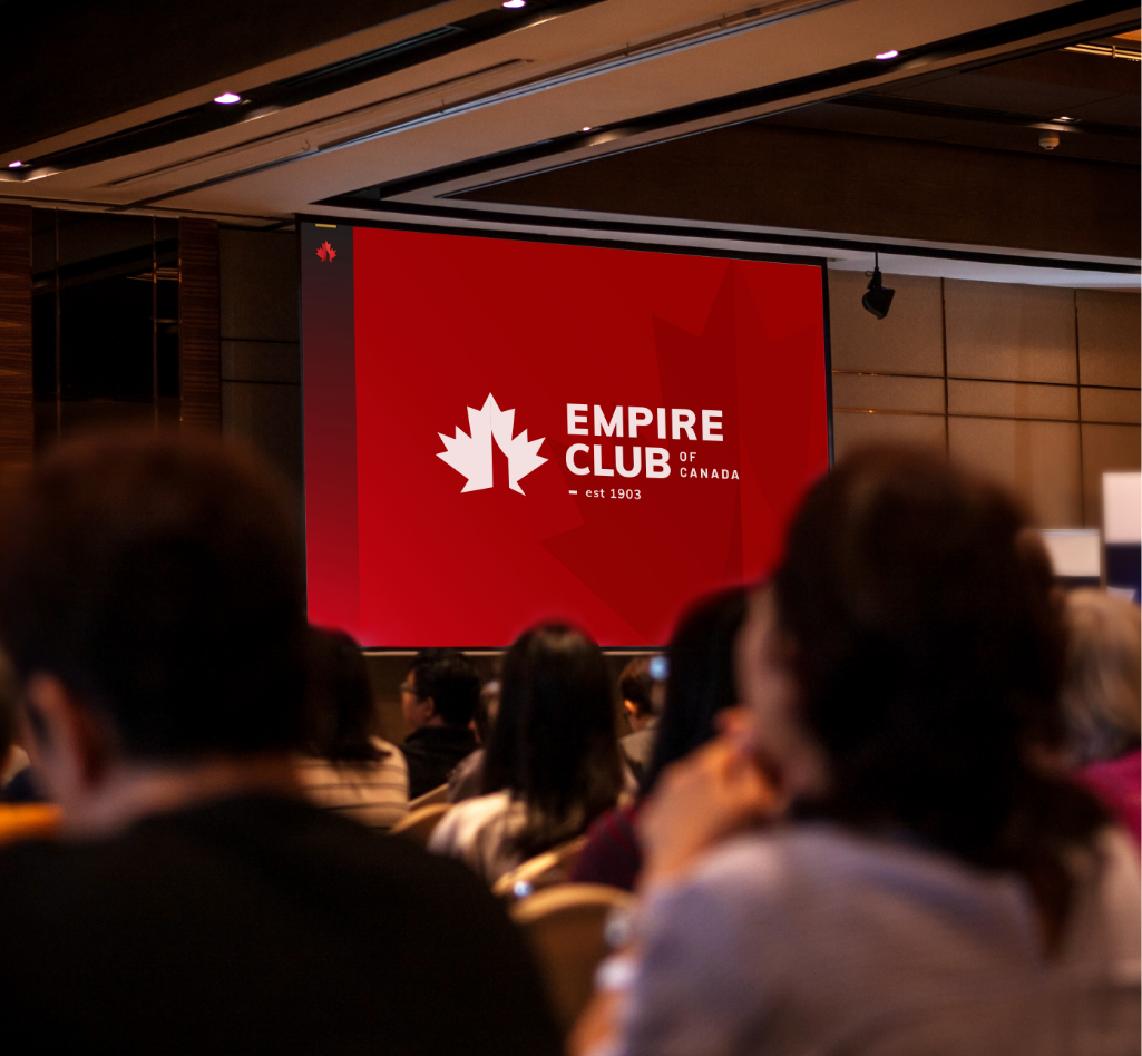 Empire Club of Canada logo on screen at a conference