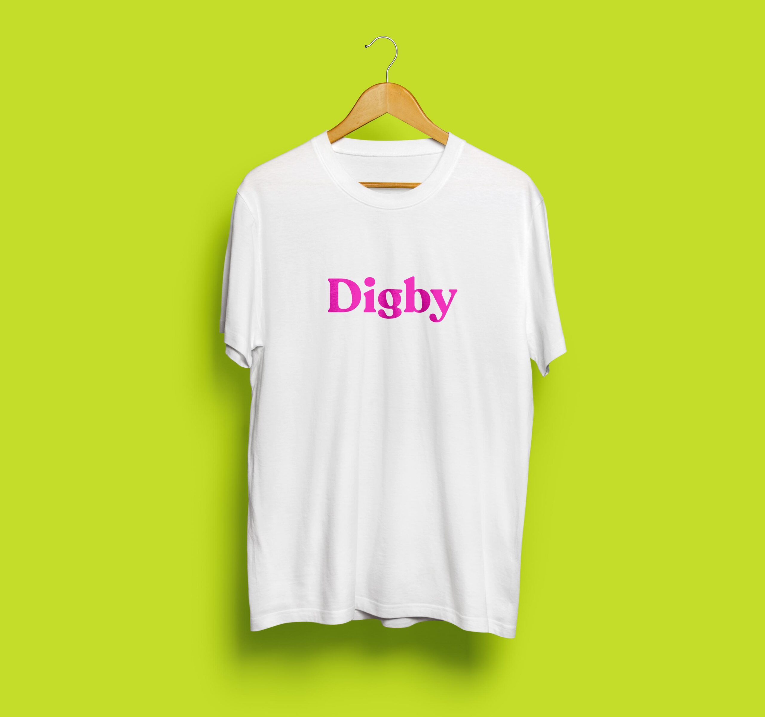 A white t-shirt with with Digby written on the chest in pink