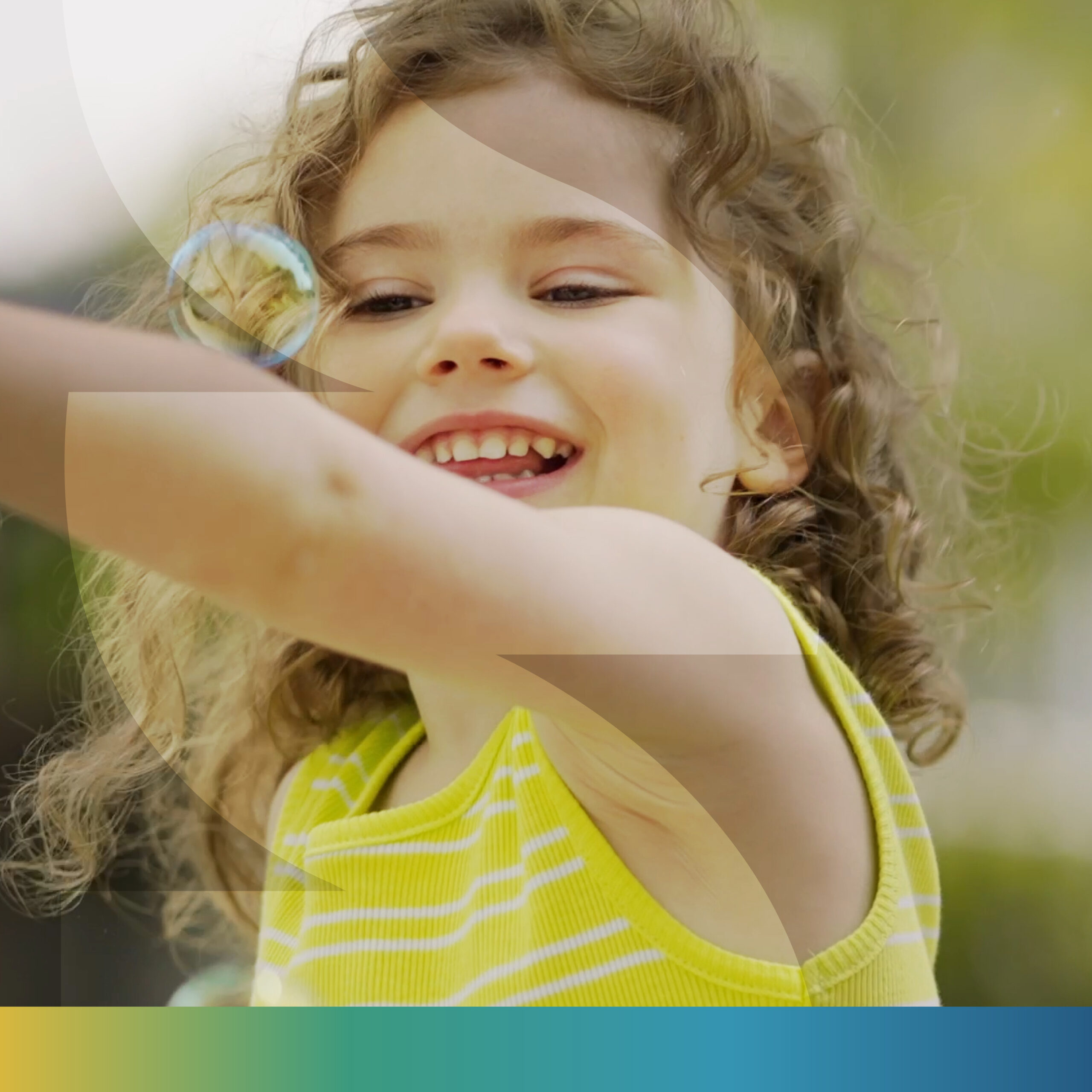 Young child playing with bubbles, with the Welland W graphic overlaid.