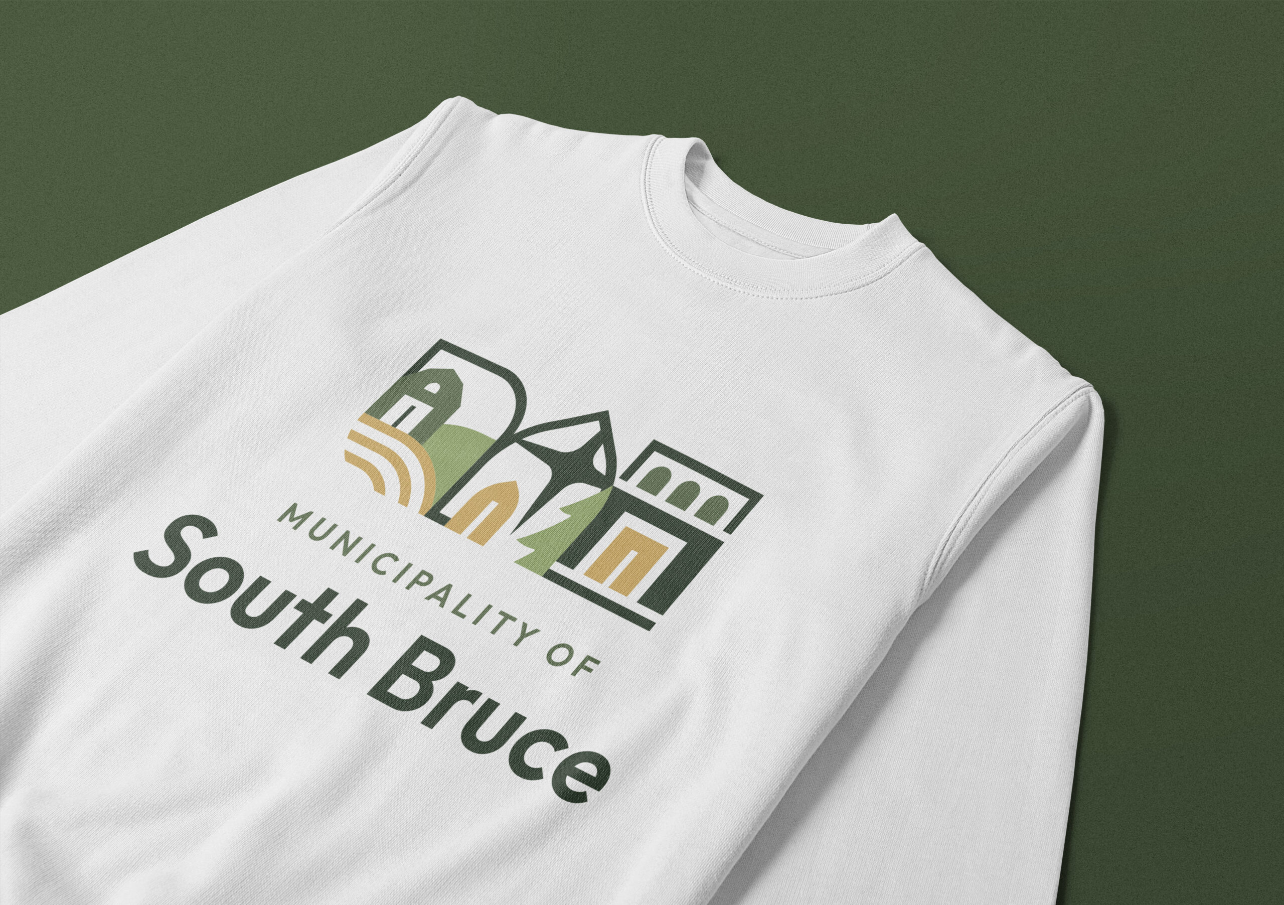 A white South Bruce-branded sweater.