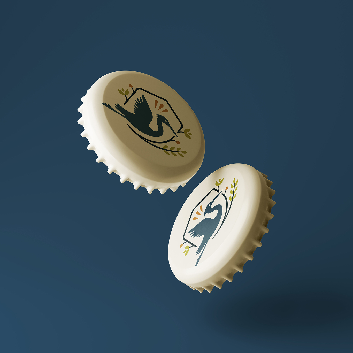 Two cream-coloured bottle caps with crane illustrations and leafy branches on a solid dark blue background.