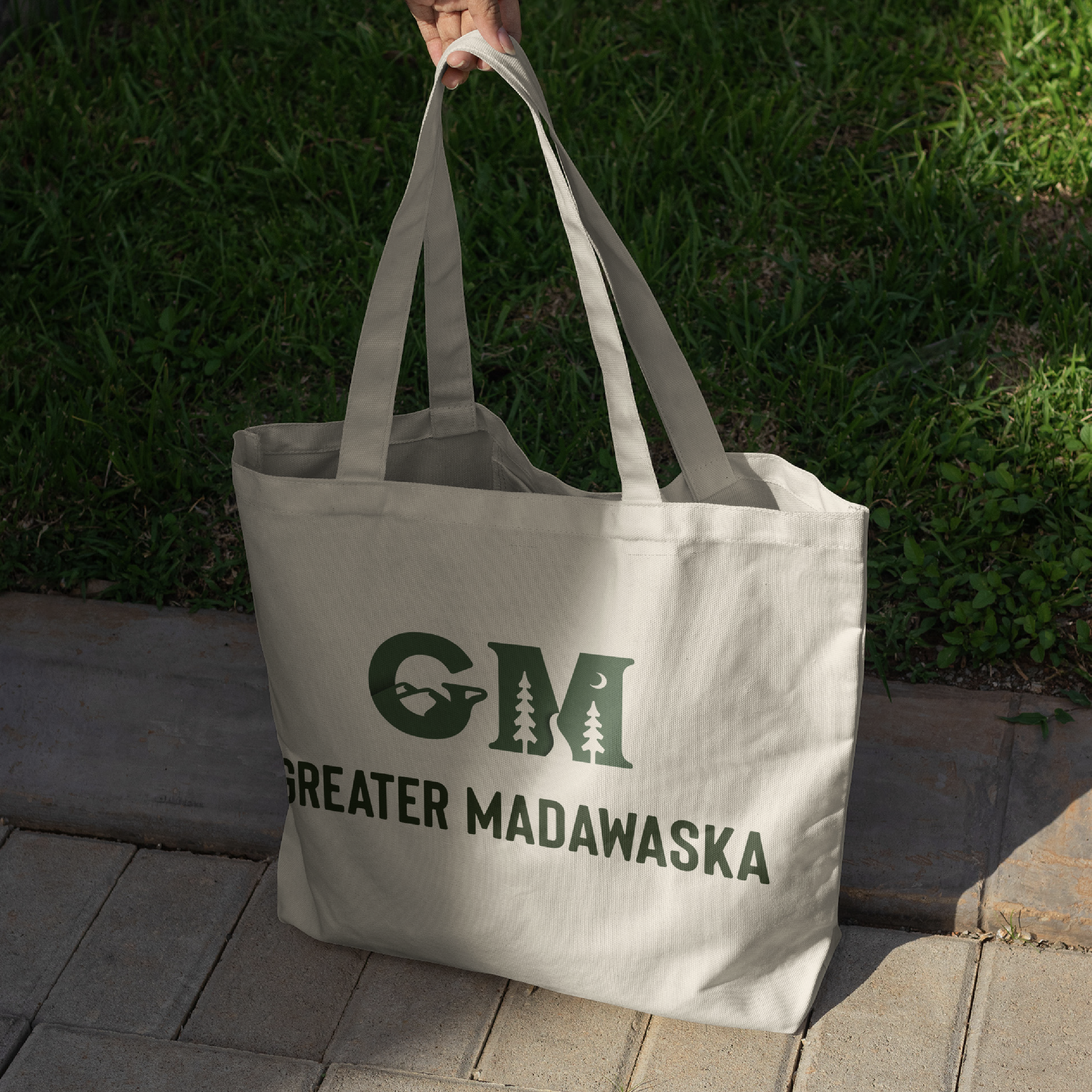 Greater Madawaska logo on white tote bag