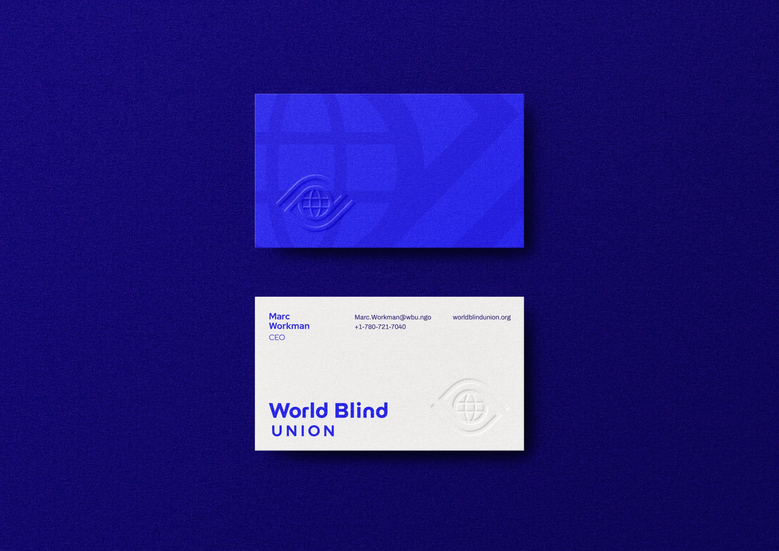 Front and back of a blue and white World Blind Union business card with logo, name, title, and contact details.