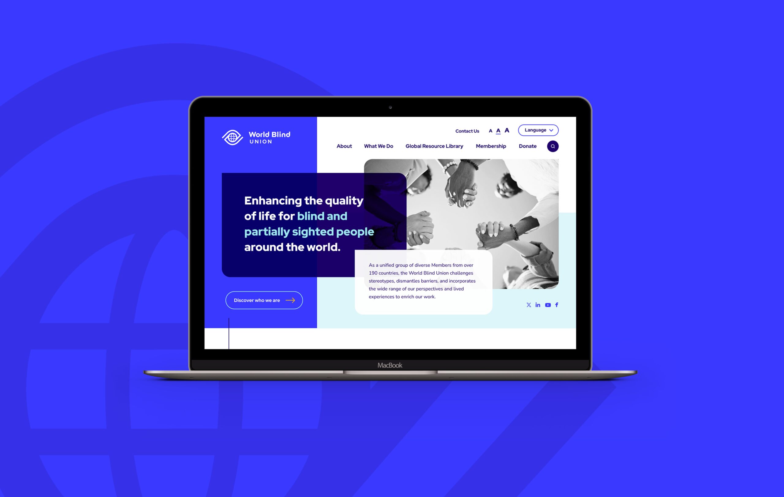 A laptop displays a website for enhancing quality of life for blind and partially sighted people on a blue background.